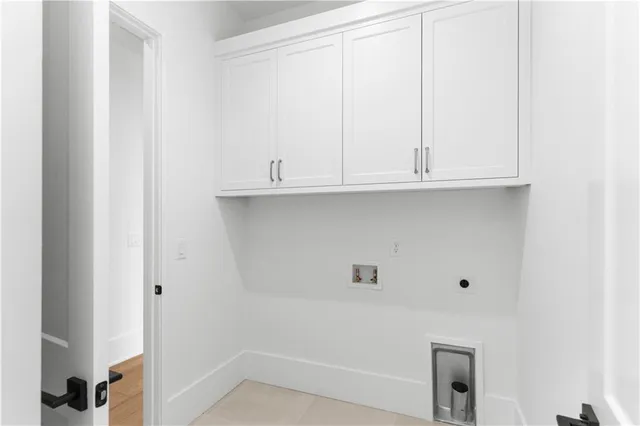 a view of a hallway a closet and mirror