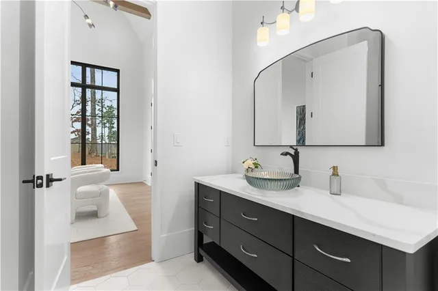 an aerial view of residential house with outdoor space and lake view