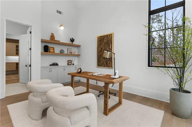 a living room with a couch and a table