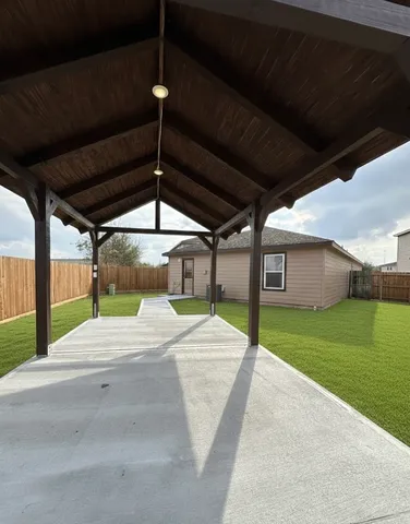 a view of a backyard of the house