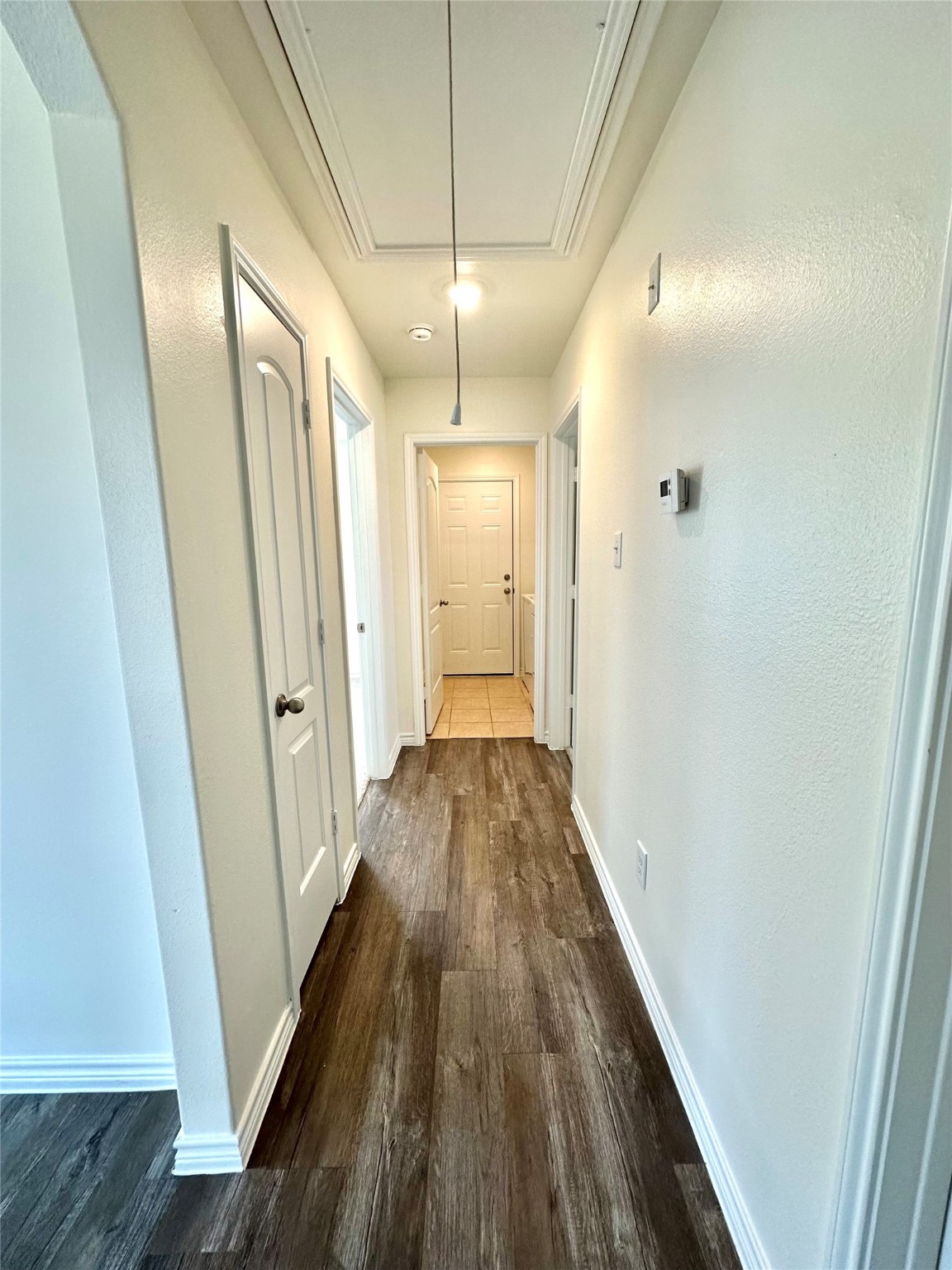 11203 Hall Ridge Court Houston, TX 77075 - Photo 12 of 21 a view of hallway with wooden floor
