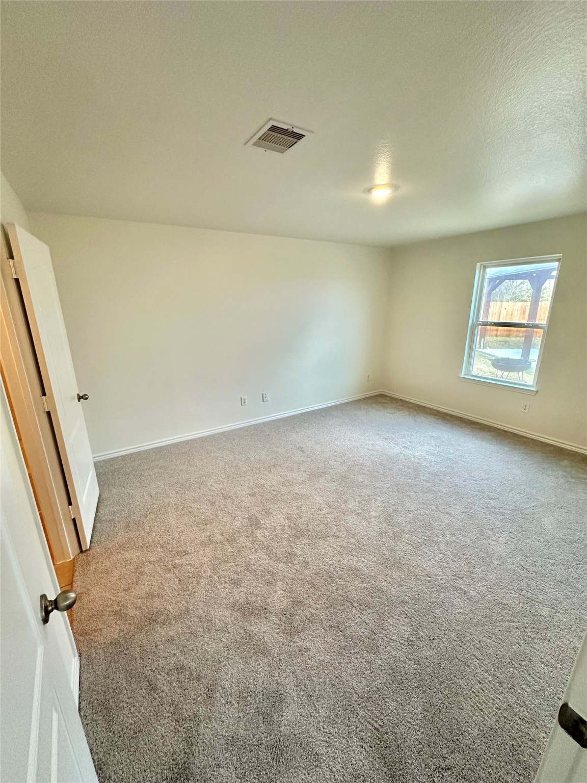 11203 Hall Ridge Court Houston, TX 77075 - Photo 9 of 21 an empty room with windows