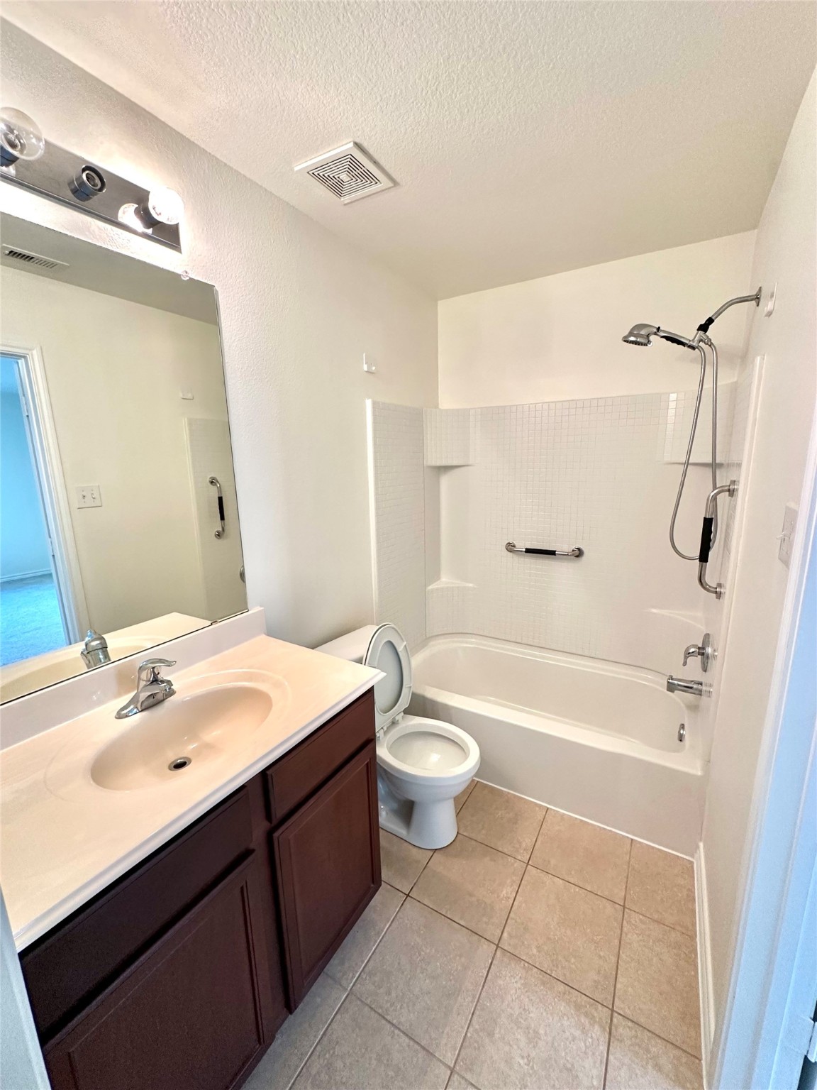 11203 Hall Ridge Court Houston, TX 77075 - Photo 10 of 21 a bathroom with a sink a toilet and shower