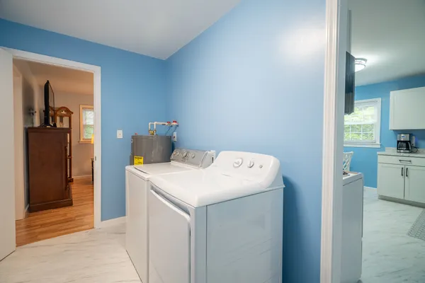a utility room with dryer and washer