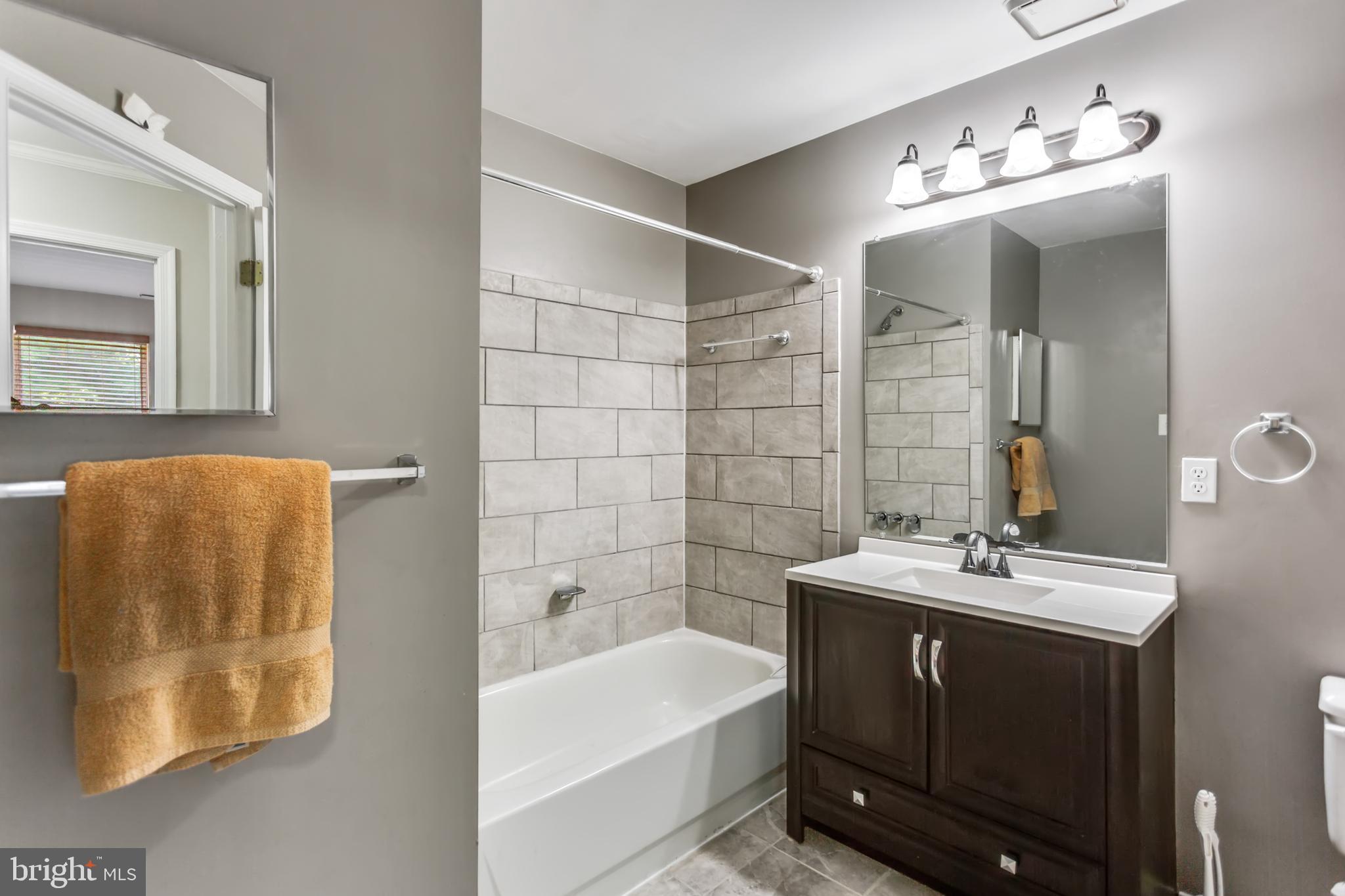 7638 Coachlight Lane Ellicott City, MD 21043 - Photo 20 of 22 Updated hall bath