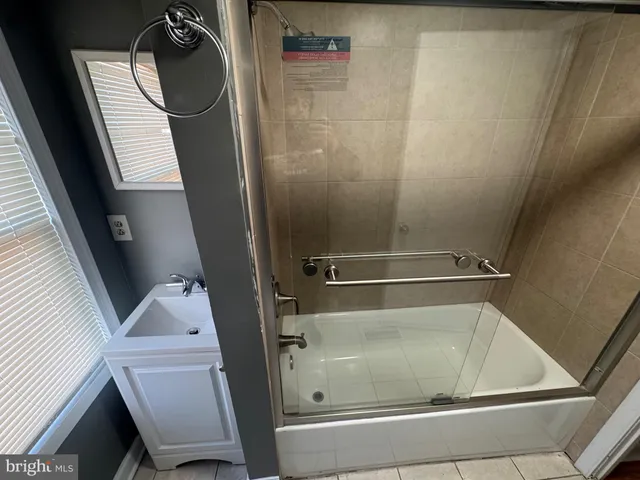 a bathroom with a bathtub