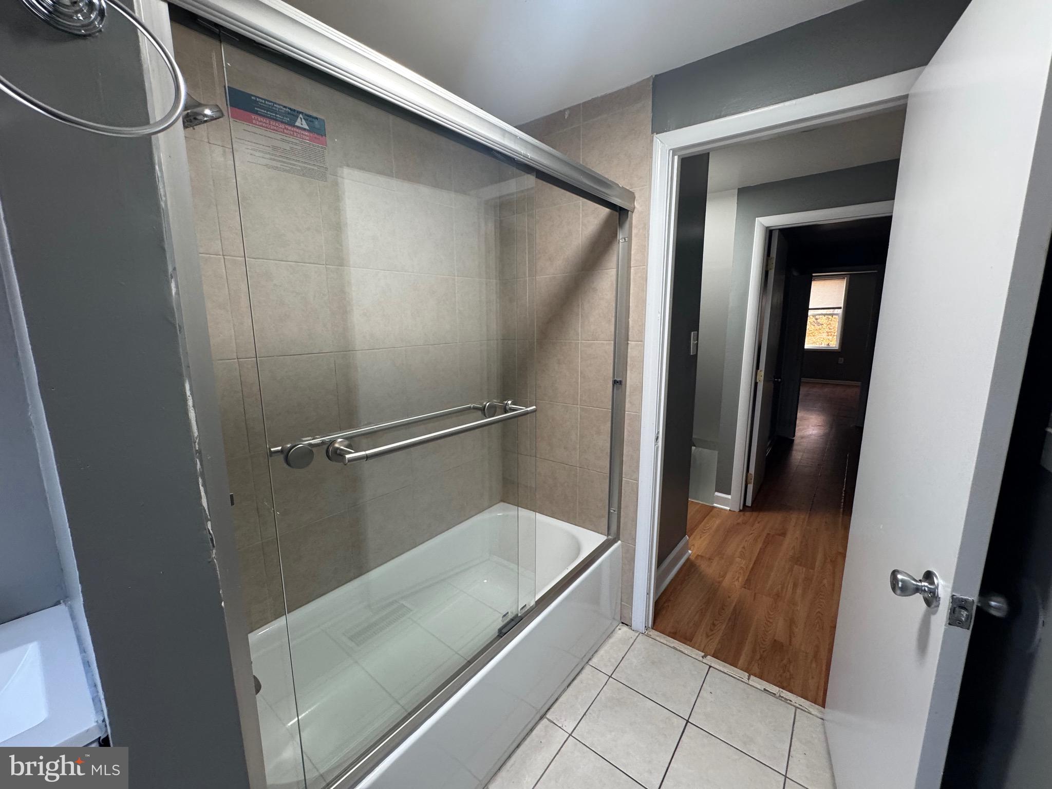 2408 Wilkens Avenue Baltimore, MD 21223 - Photo 15 of 26 a bathroom with a bathtub