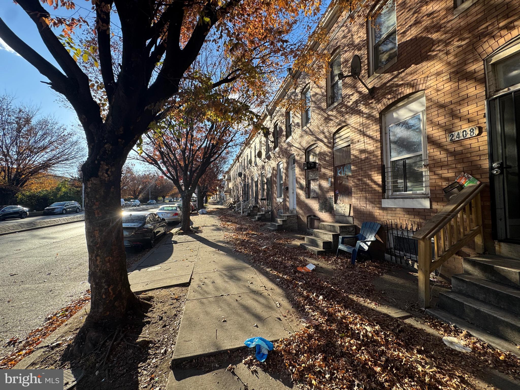 2408 Wilkens Avenue Baltimore, MD 21223 - Photo 25 of 26 a view of a yard with plants and trees