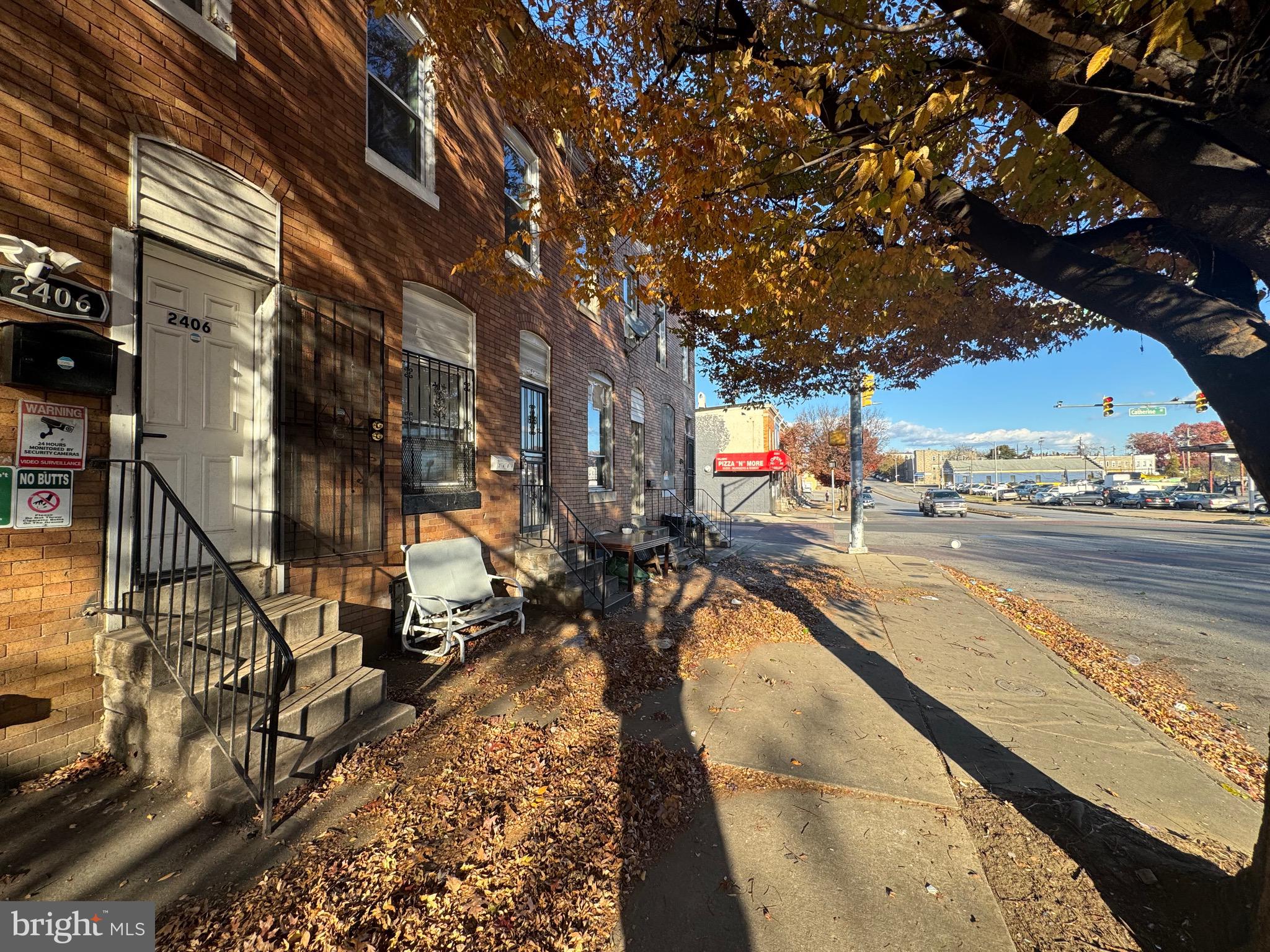 2408 Wilkens Avenue Baltimore, MD 21223 - Photo 26 of 26 a view of a swimming pool with an outdoor seating