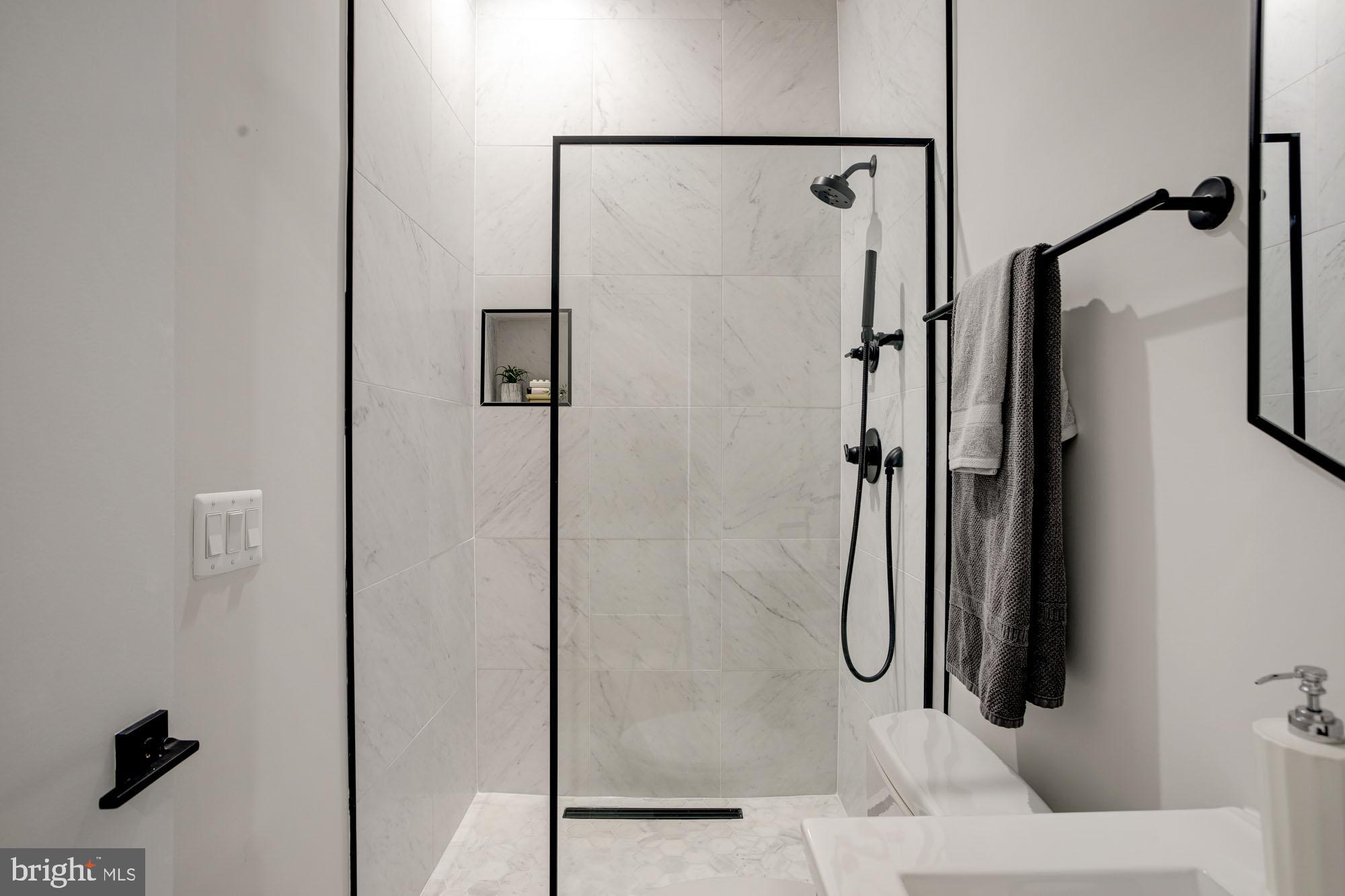 1225 11th Street Northwest, Unit 6 Washington, DC 20001 - Photo 8 of 15 a bathroom with a shower