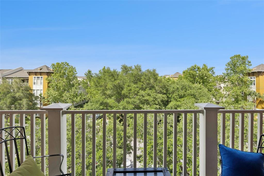 1400 Celebration Avenue, Unit 401 Celebration, FL 34747 - Photo 34 of 68 a view of a balcony with outdoor space