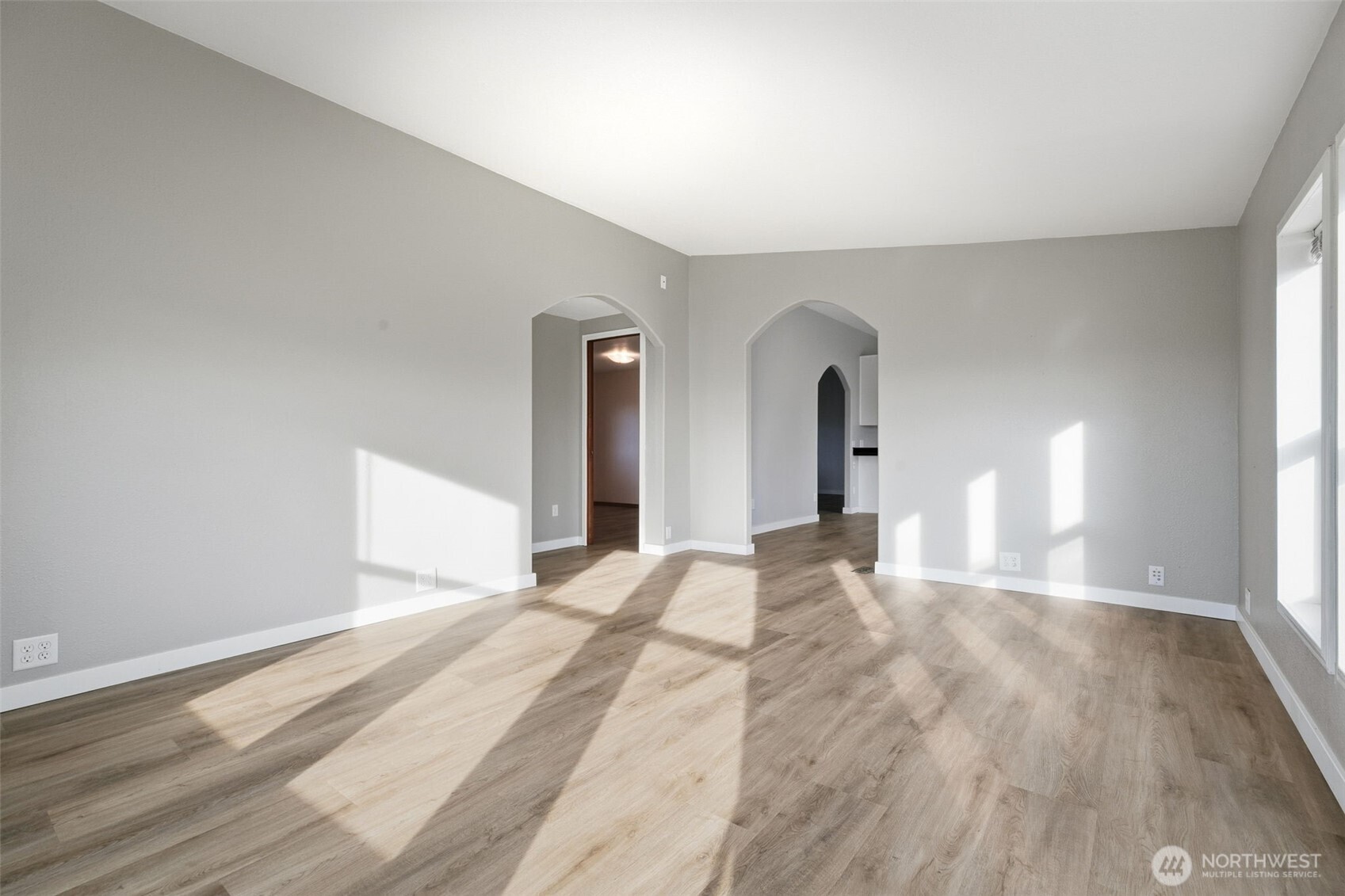401 Clemans View Road Selah, WA 98942 - Photo 18 of 28 a view of empty room with wooden floor and fan