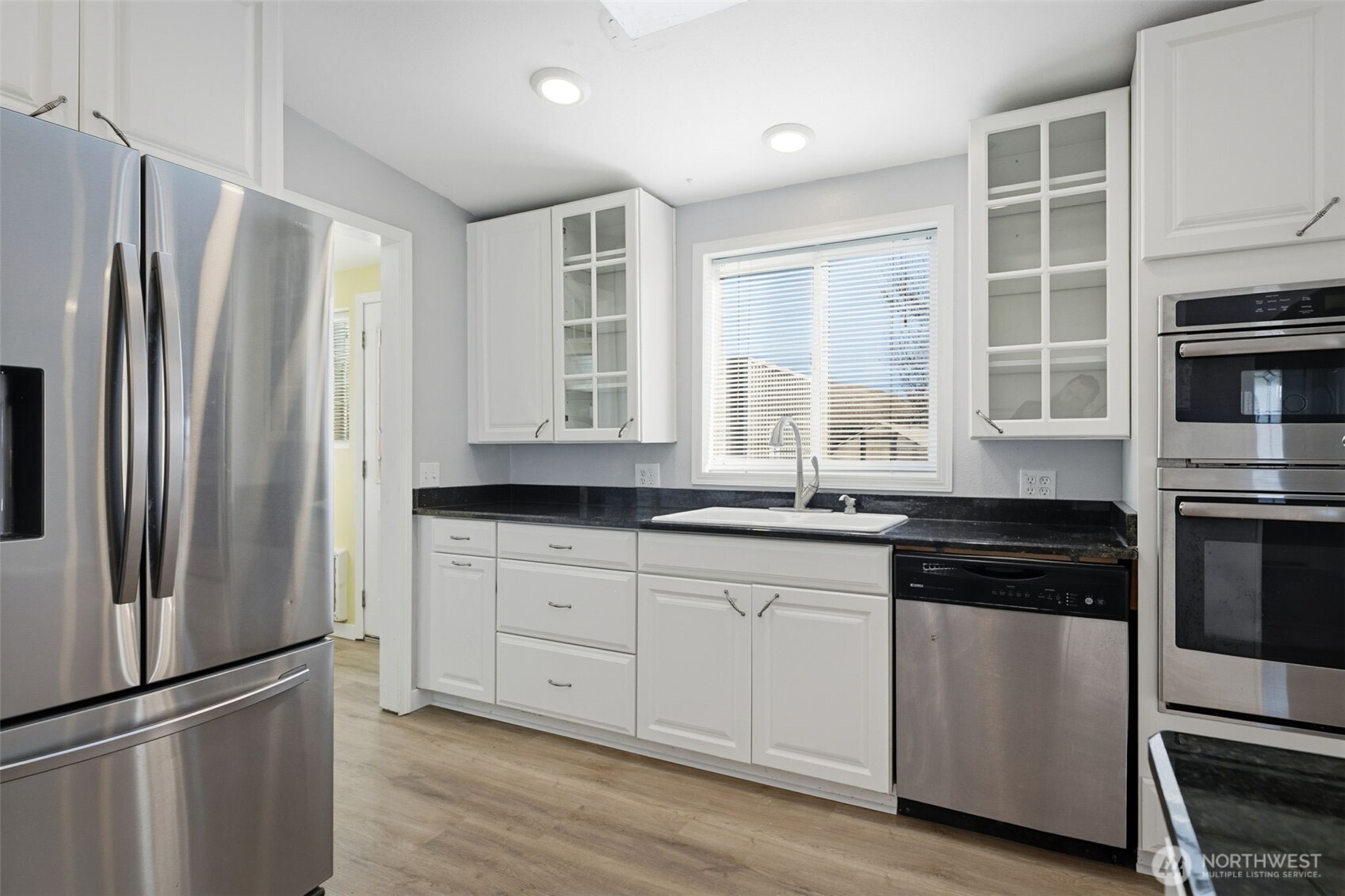401 Clemans View Road Selah, WA 98942 - Photo 22 of 28 a kitchen with stainless steel appliances granite countertop a refrigerator and a sink