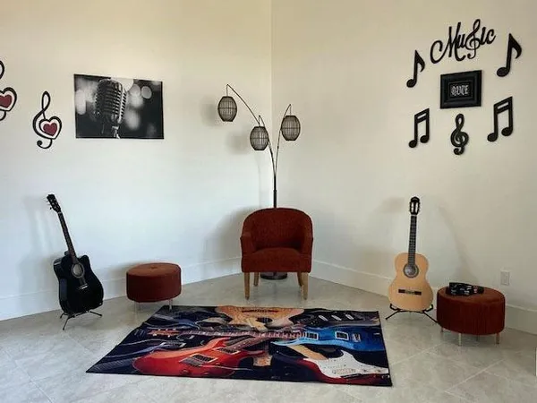 a bed room with a bed and a television