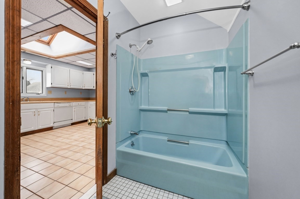 6 Trask Street Danvers, MA 01923 - Photo 18 of 42 a bathroom with a bathtub and a shower