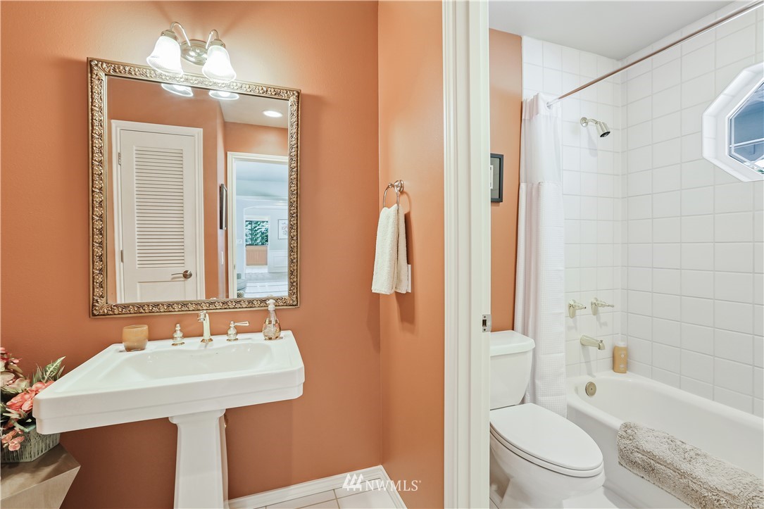 1325 North 24th Street Renton, WA 98056 - Photo 31 of 40 a bathroom with a sink toilet tub and shower