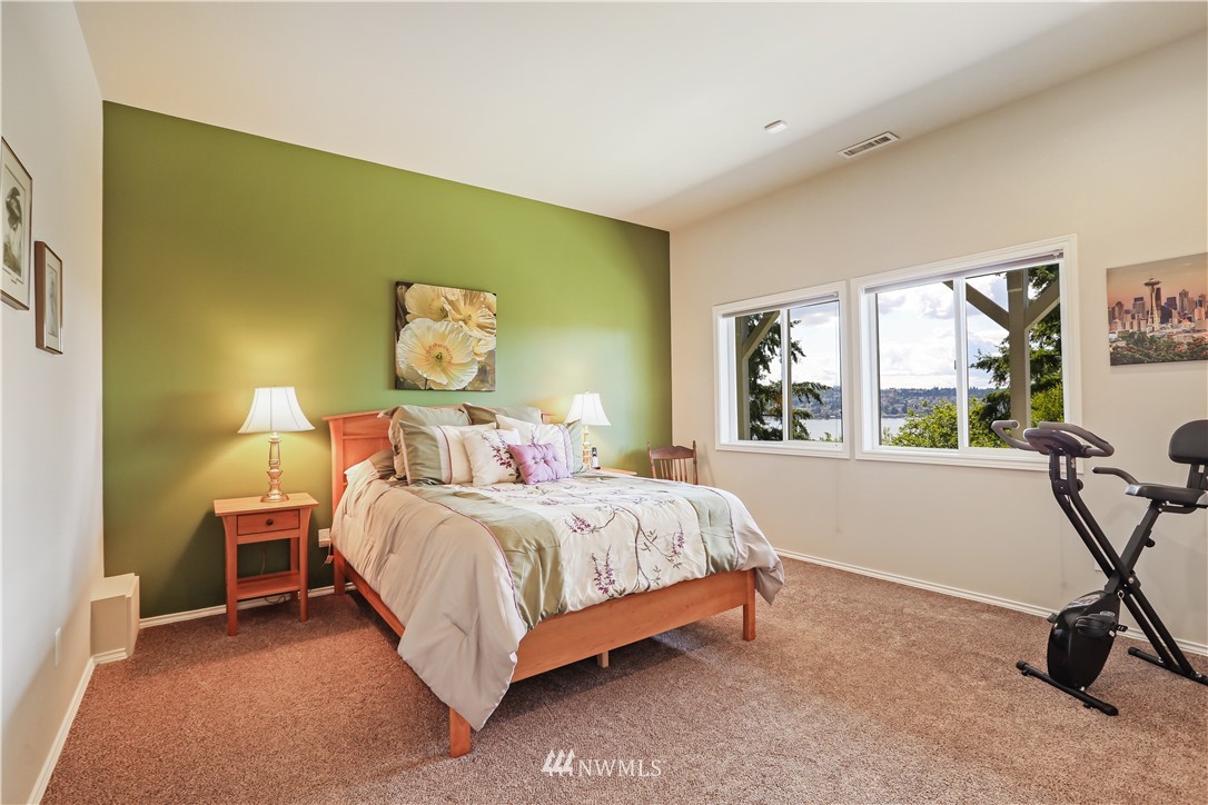 1325 North 24th Street Renton, WA 98056 - Photo 32 of 40 a bed room with a bed and a window