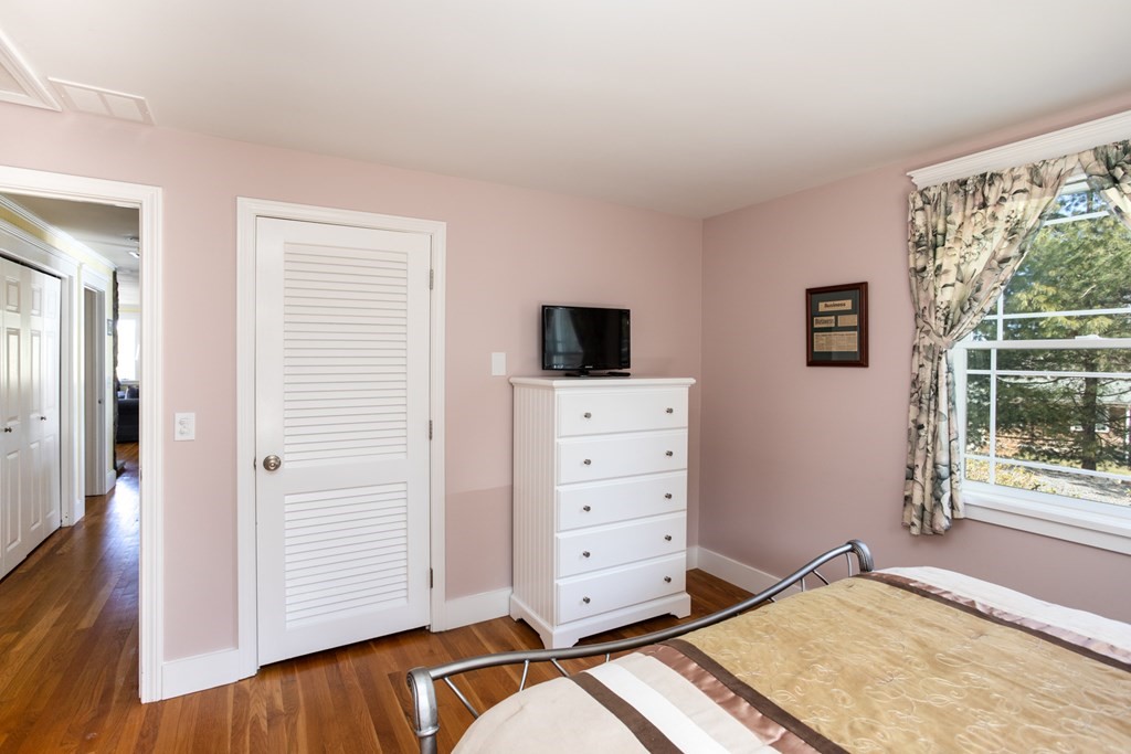 40 Bay Cotuit, MA 02635 - Photo 15 of 24 a room with furniture and flat screen tv