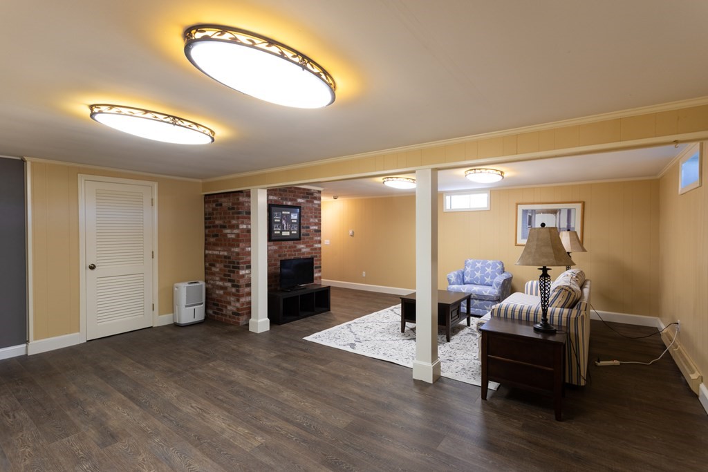 40 Bay Cotuit, MA 02635 - Photo 19 of 24 a living room with furniture and wooden floor