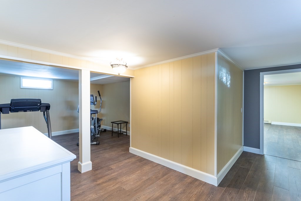 40 Bay Cotuit, MA 02635 - Photo 20 of 24 a view of a hallway a room with wooden floor and cabinet