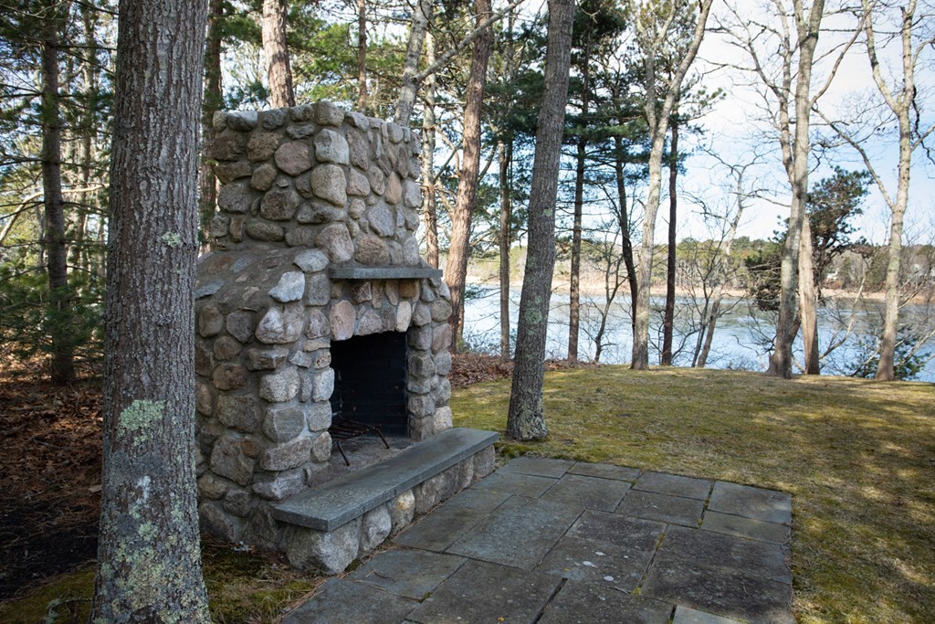 40 Bay Cotuit, MA 02635 - Photo 6 of 24 a view of a yard with a tree