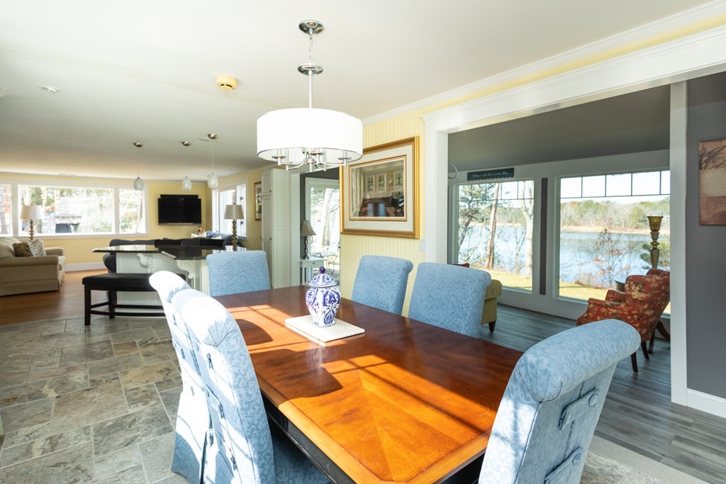 40 Bay Cotuit, MA 02635 - Photo 9 of 24 a view of a dining room with furniture window and outside view