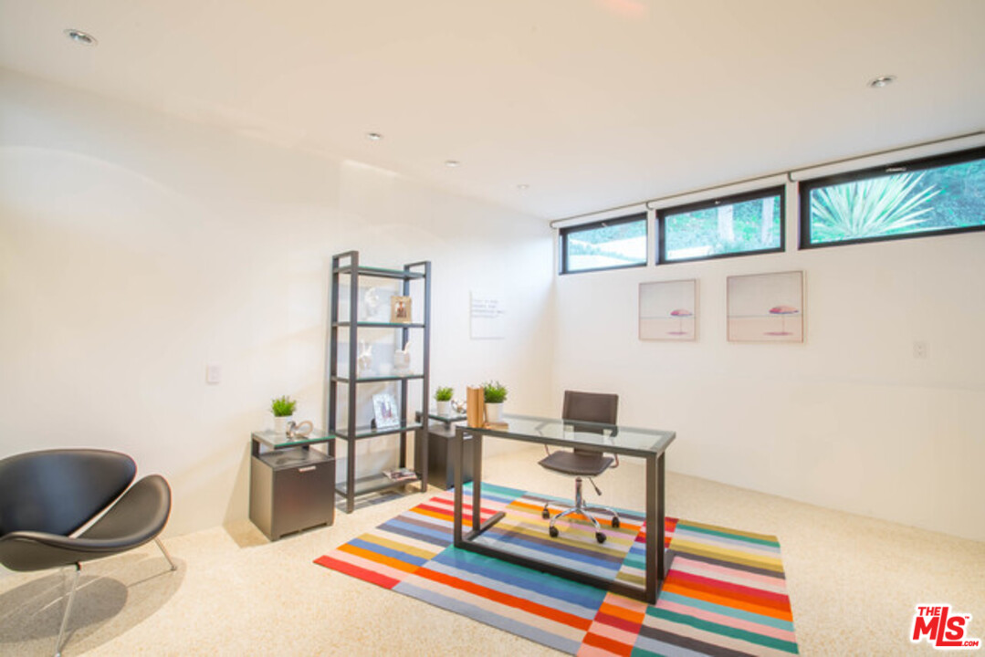 1440 North Kings Road Los Angeles, CA 90069 - Photo 24 of 37 a living room with furniture and next to a window