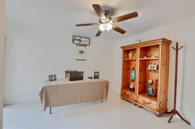 a bed room with a bed and a window