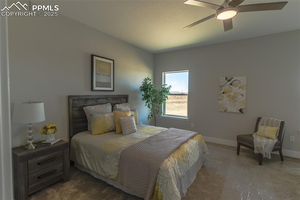 Lot 3 J D Johnson Road Peyton, CO 80831 - Photo 22 of 47 a bedroom with a bed and a window