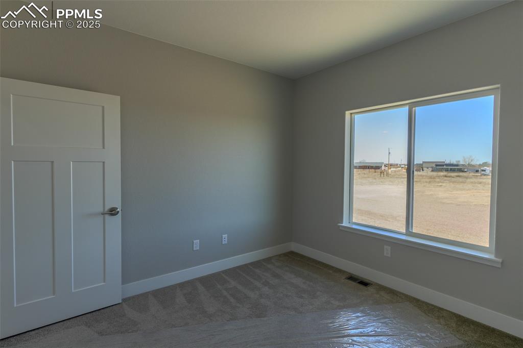 Lot 3 J D Johnson Road Peyton, CO 80831 - Photo 32 of 47 an empty room with a window