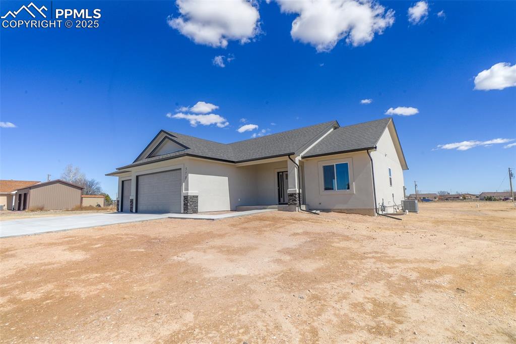 Lot 3 J D Johnson Road Peyton, CO 80831 - Photo 5 of 47 a view of a house with a yard