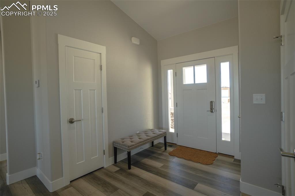 Lot 3 J D Johnson Road Peyton, CO 80831 - Photo 7 of 47 a view of an empty room with wooden floor and a window
