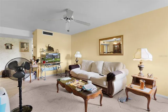 $107,000 | 15104 Sandalwood Drive, Unit 104, Wildwood, FL 34785