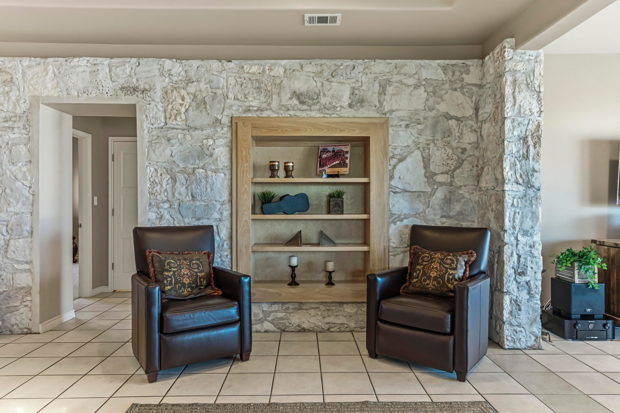 15943 Booth Circle Volente, TX 78641 - Photo 11 of 35 a living room with furniture and a fireplace