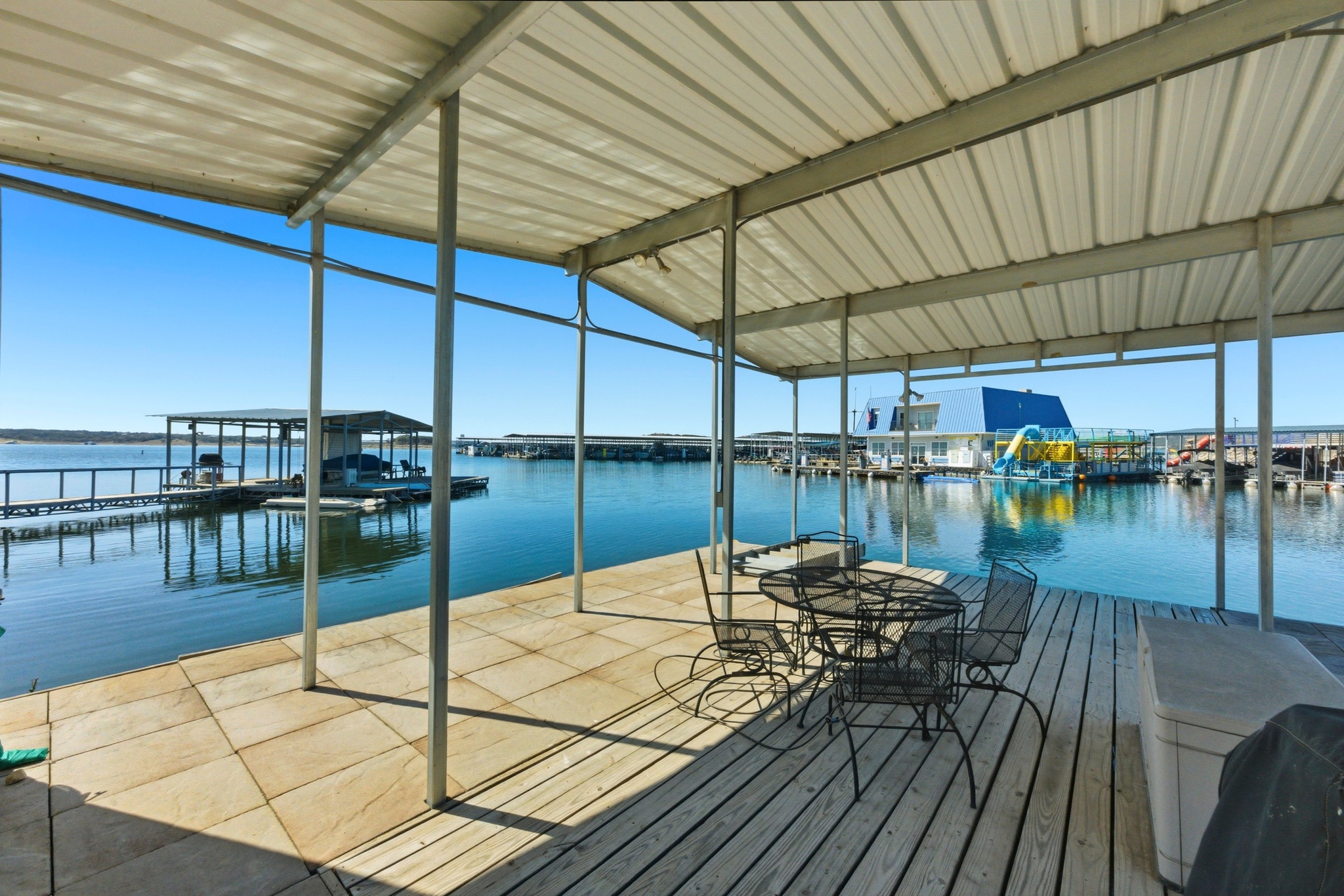 15943 Booth Circle Volente, TX 78641 - Photo 19 of 35 a view of a swimming pool with a patio