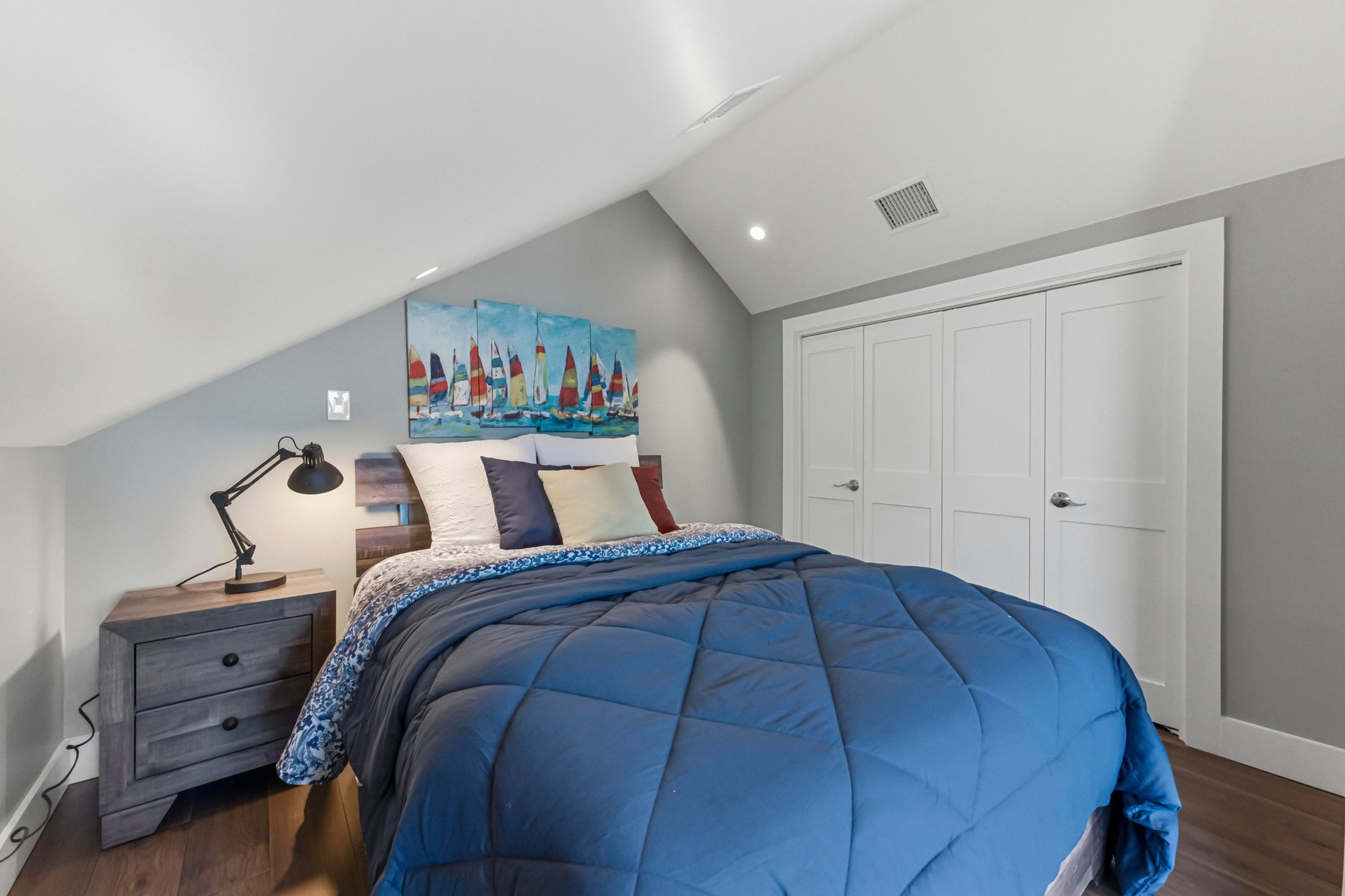 15943 Booth Circle Volente, TX 78641 - Photo 28 of 35 a bed sitting in a bedroom and painting on the wall