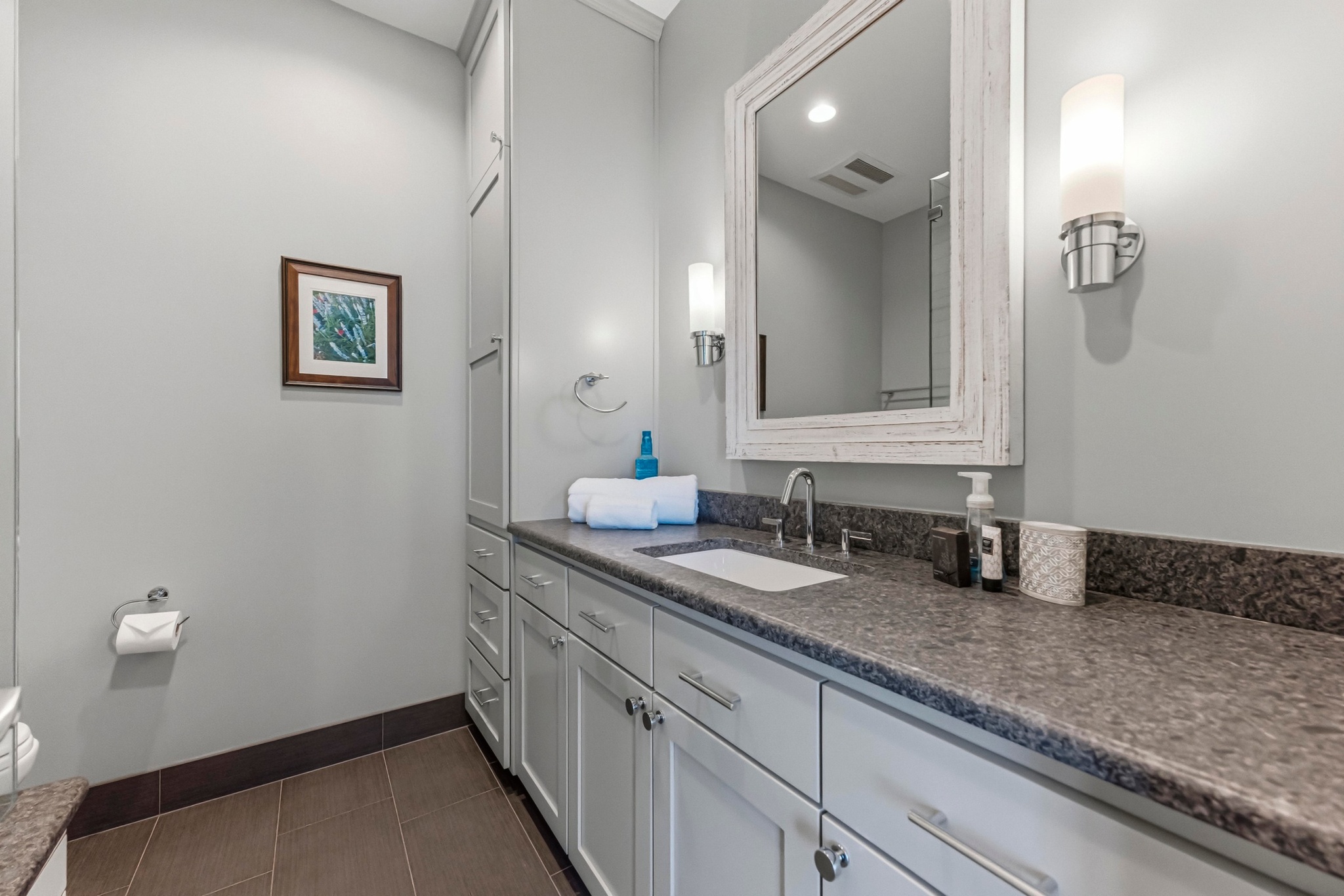 15943 Booth Circle Volente, TX 78641 - Photo 29 of 35 a bathroom with 2 sink and a mirror