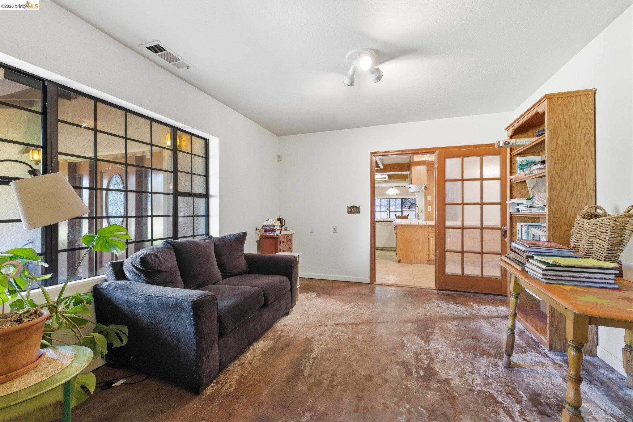 23608 Porcina Way Columbia, CA 95310 - Photo 20 of 51 a living room with furniture and a window
