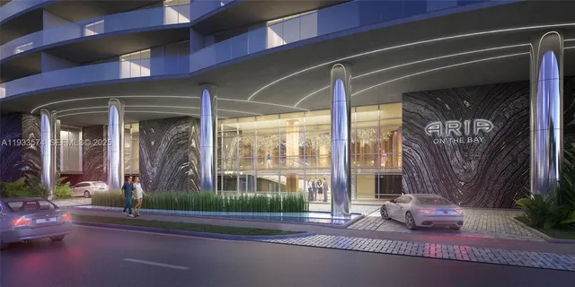 a view of a living room and entryway