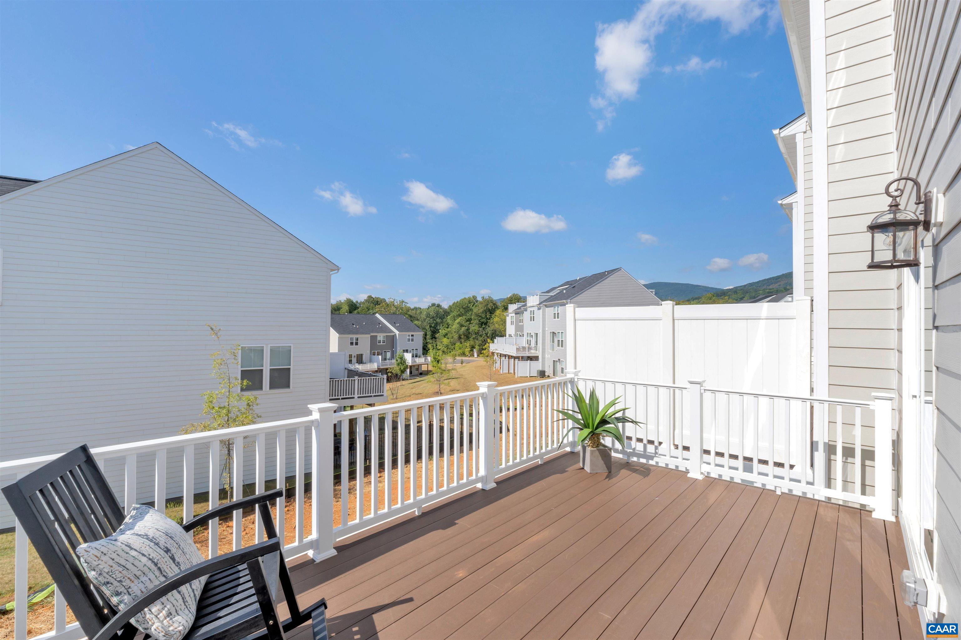 2990 Rambling Brk Lane, Unit LOT 125 Crozet, VA 22932 - Photo 30 of 44 a view of a balcony with wooden floor