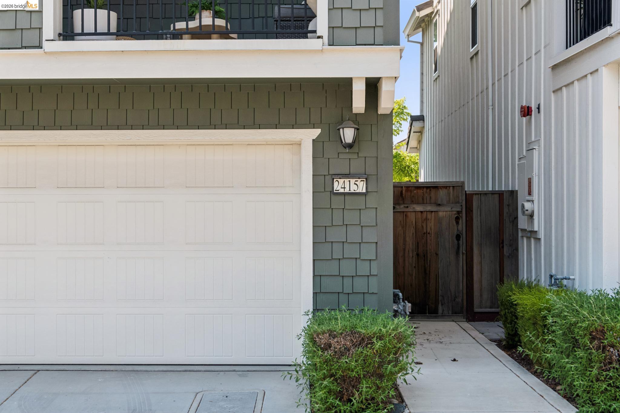 24157 Amaranth Loop Hayward, CA 94541 - Photo 57 of 63 White panel garage door with decorative trim