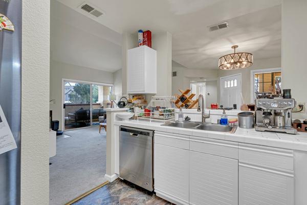 6971 Dublin Meadows Street, Unit F Dublin, CA 94568 - Photo 11 of 29 a kitchen with sink and cabinets