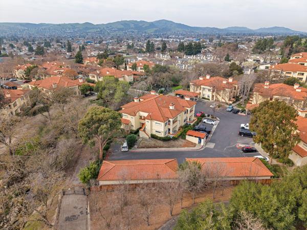 6971 Dublin Meadows Street, Unit F Dublin, CA 94568 - Photo 27 of 29 an aerial view of residential houses with outdoor space