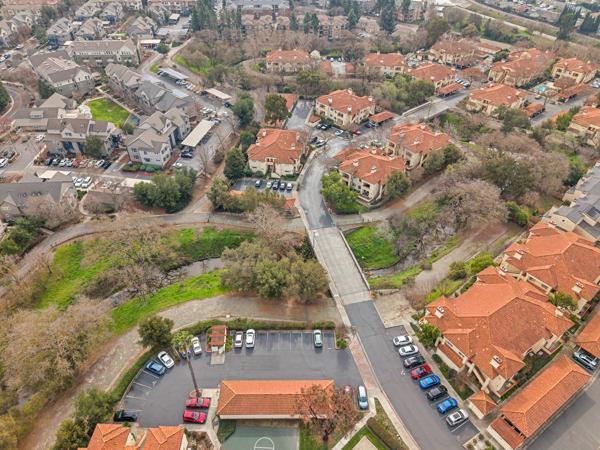 6971 Dublin Meadows Street, Unit F Dublin, CA 94568 - Photo 28 of 29 an aerial view of residential houses with outdoor space