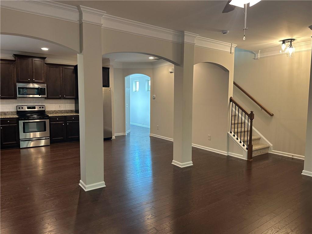 403 Village View Woodstock, GA 30188 - Photo 11 of 35 an empty room with wooden floor and windows