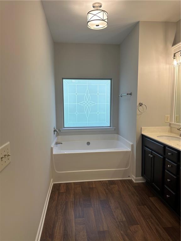 403 Village View Woodstock, GA 30188 - Photo 19 of 35 a bathroom with a tub and a sink