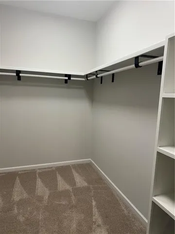 a view of small space with racks on the wall