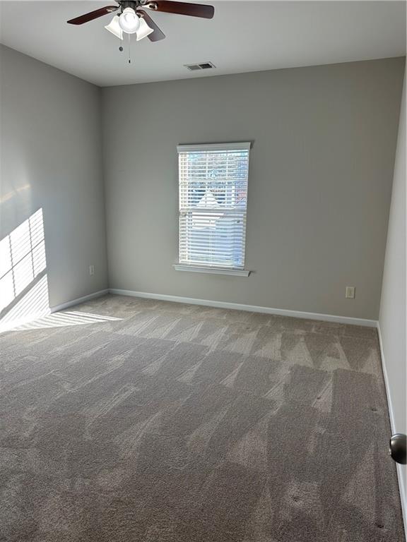 403 Village View Woodstock, GA 30188 - Photo 28 of 35 a view of an empty room with a window