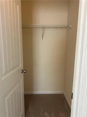 a view of small space with racks on the wall