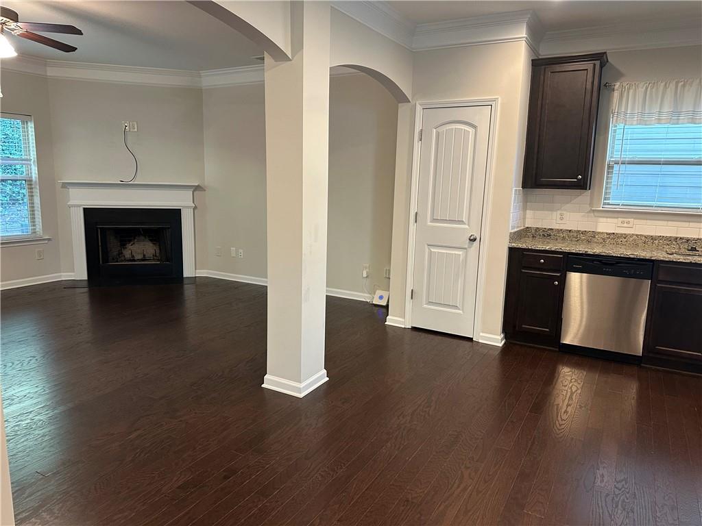 403 Village View Woodstock, GA 30188 - Photo 7 of 35 a view of a livingroom with wooden floor and a fireplace